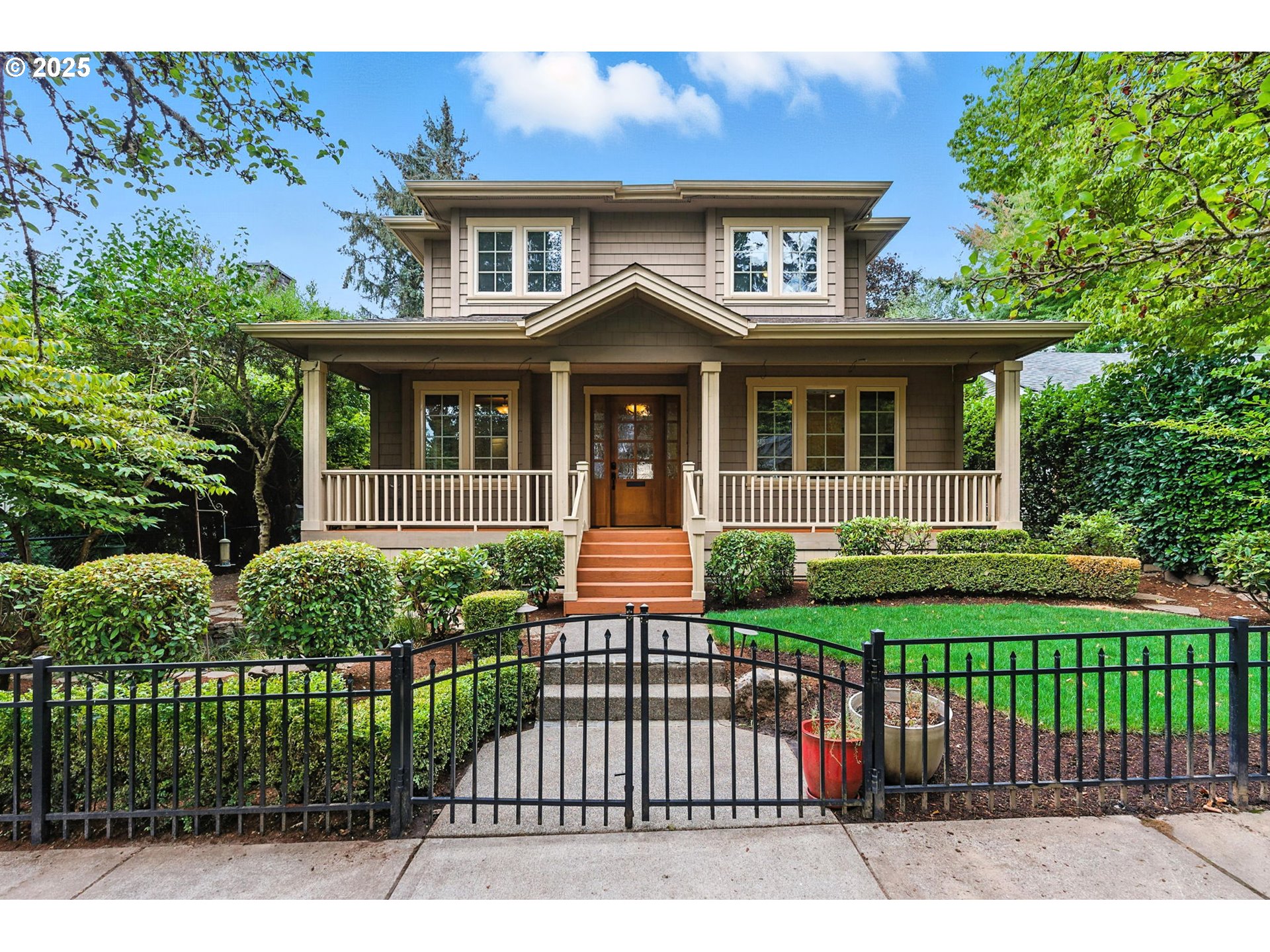 784 3rd Street Lake Oswego, OR 97034 - Photo 1 of 48 a front view of a house with a garden