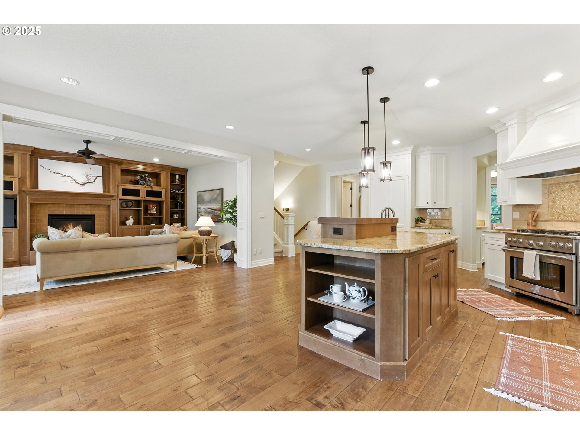 784 3rd Street Lake Oswego, OR 97034 - Photo 13 of 48 a living room with kitchen island furniture and a kitchen view