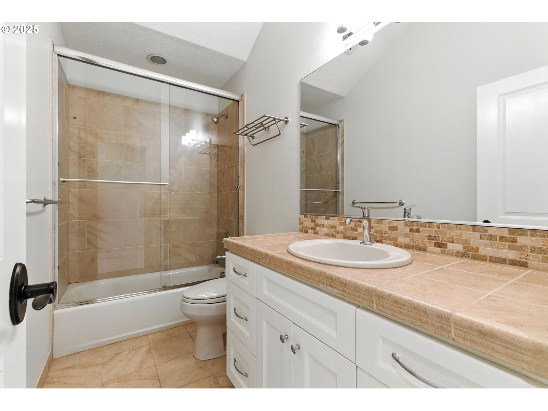 784 3rd Street Lake Oswego, OR 97034 - Photo 32 of 48 a bathroom with a sink a toilet and shower