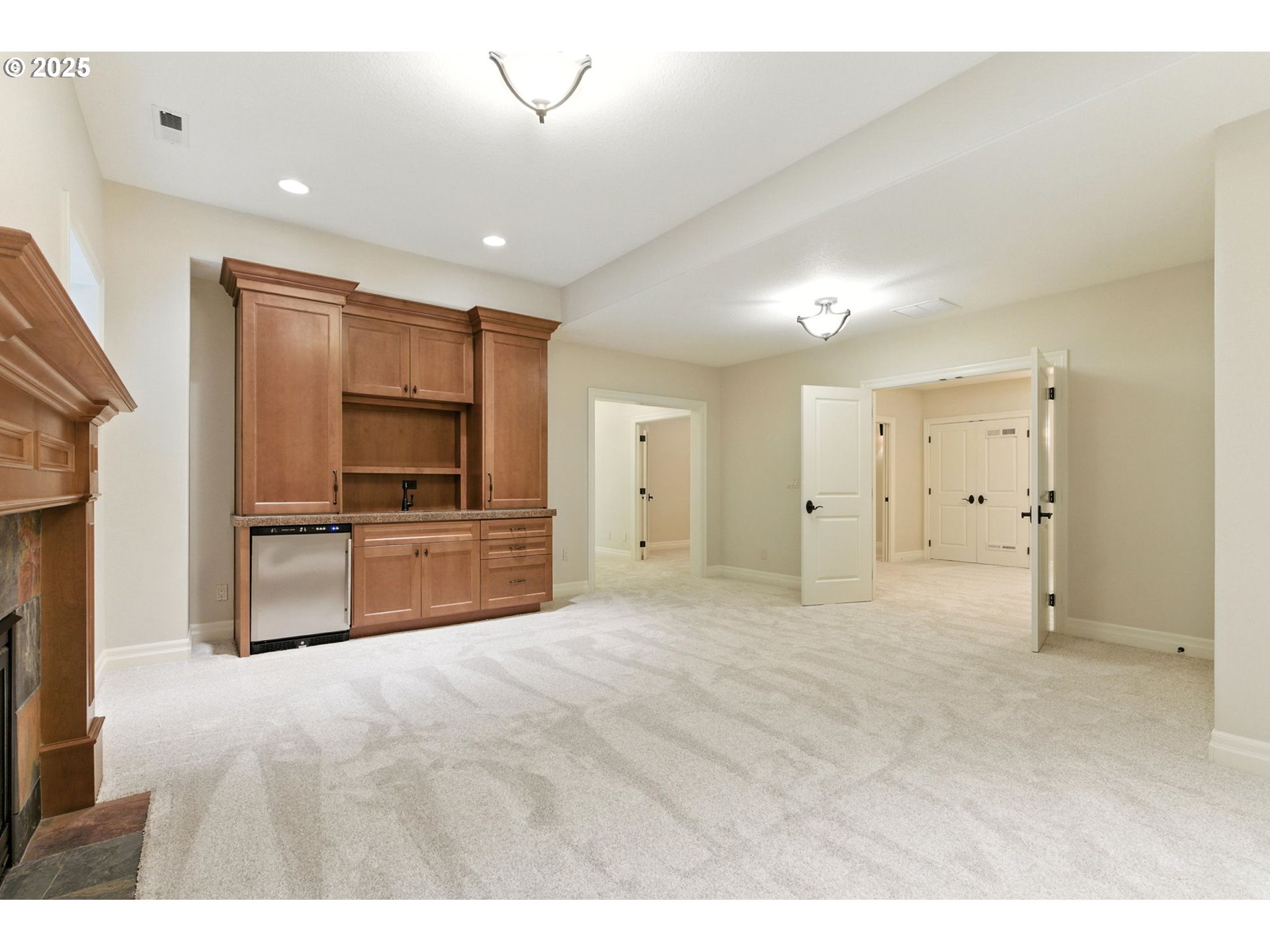 784 3rd Street Lake Oswego, OR 97034 - Photo 36 of 48 a view of a kitchen with a sink and stainless steel appliances