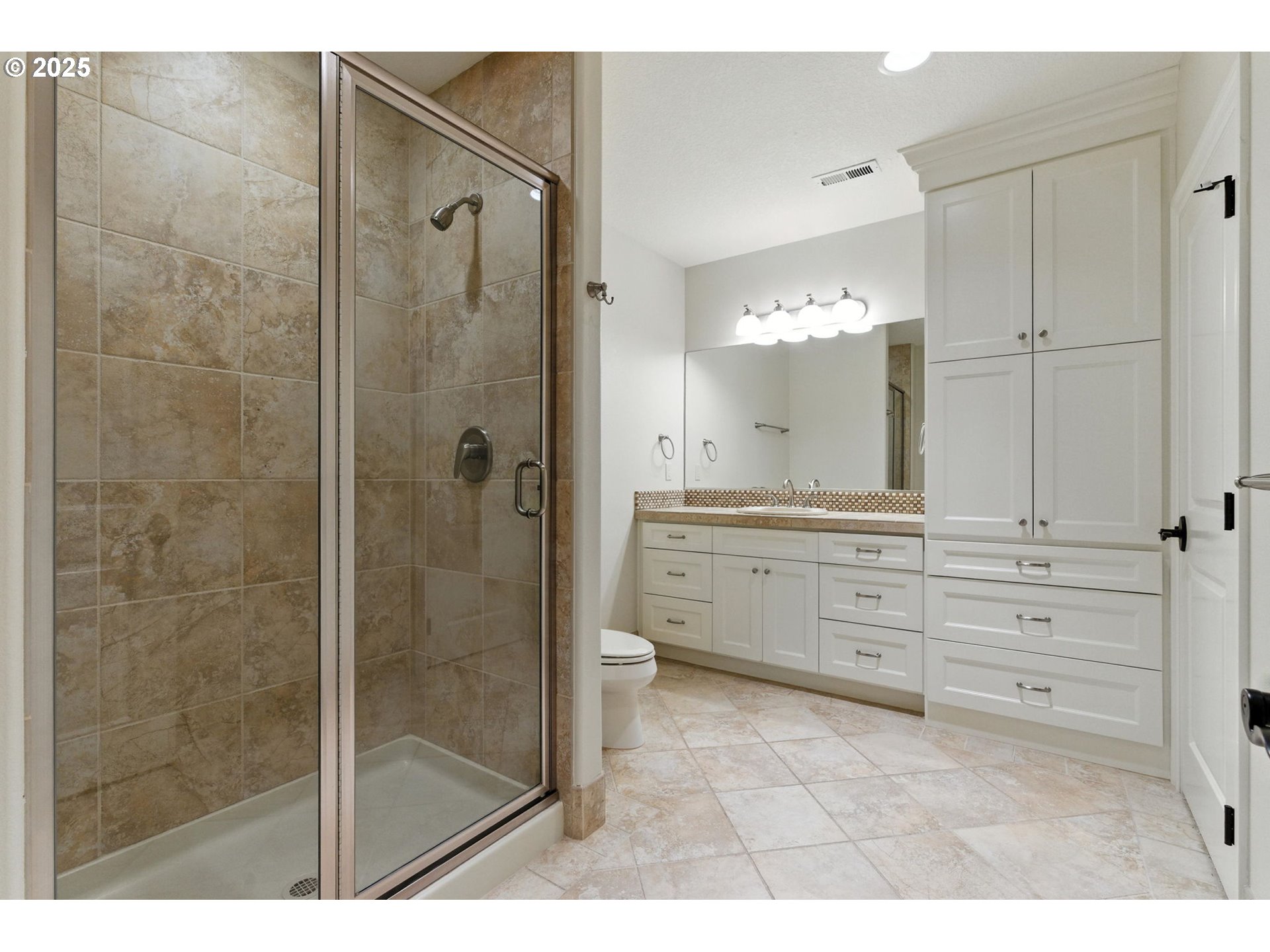 784 3rd Street Lake Oswego, OR 97034 - Photo 40 of 48 a bathroom with a shower sink and mirror