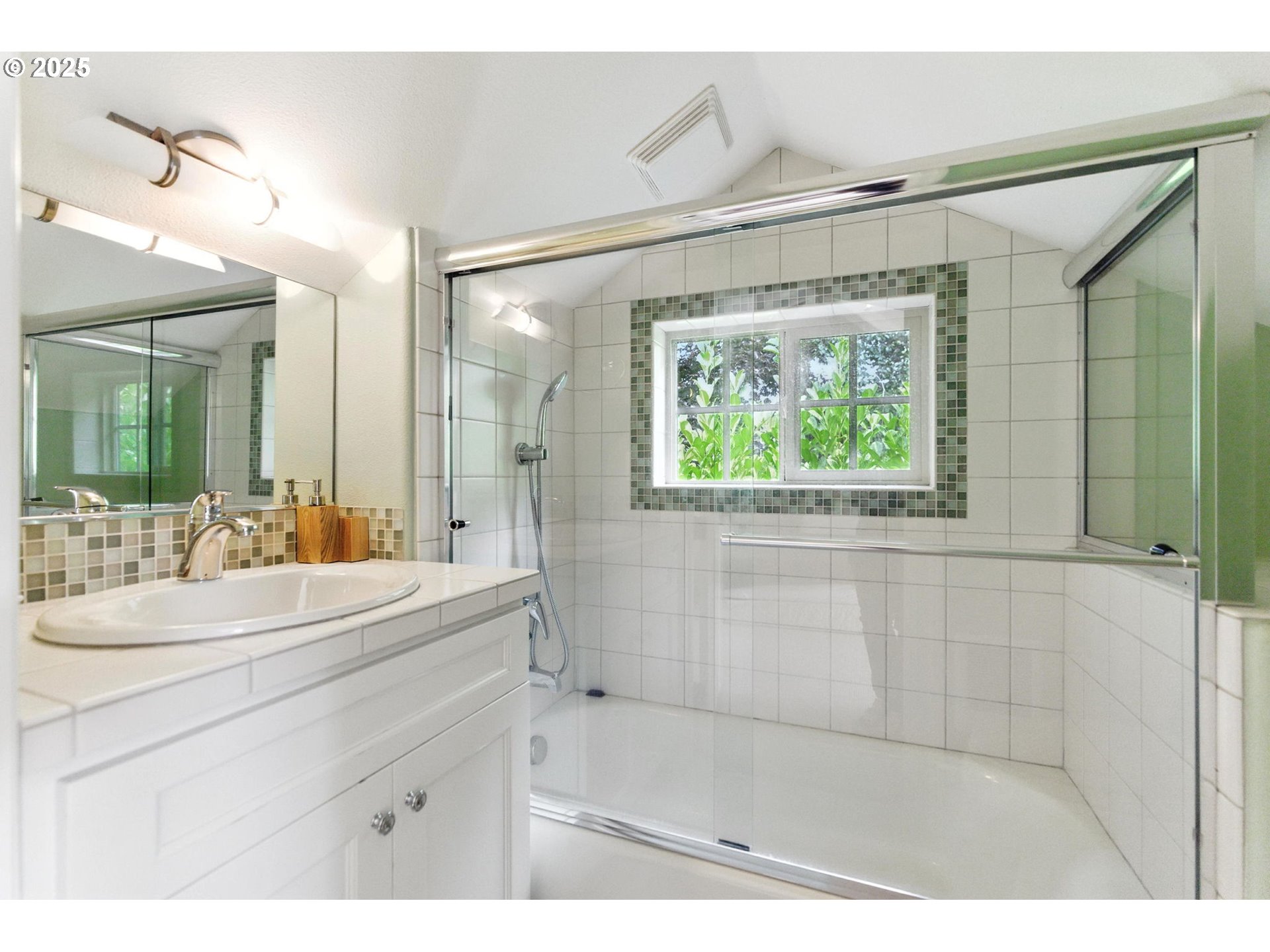 784 3rd Street Lake Oswego, OR 97034 - Photo 44 of 48 a bathroom with a sink and a mirror
