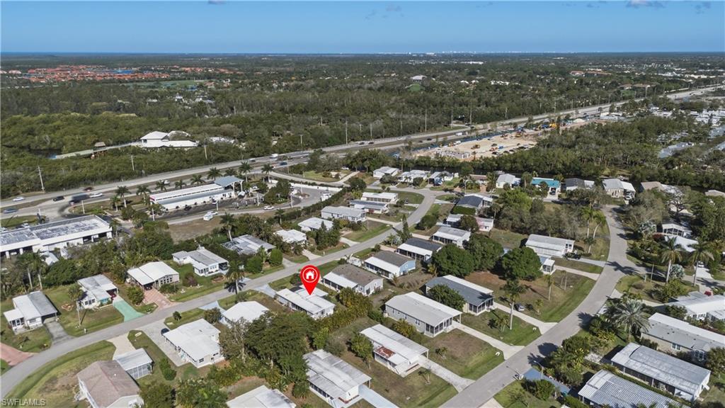 140 Rookery Road Naples, FL 34114 - Photo 15 of 19 Aerial overview of property's location with nearby suburban area