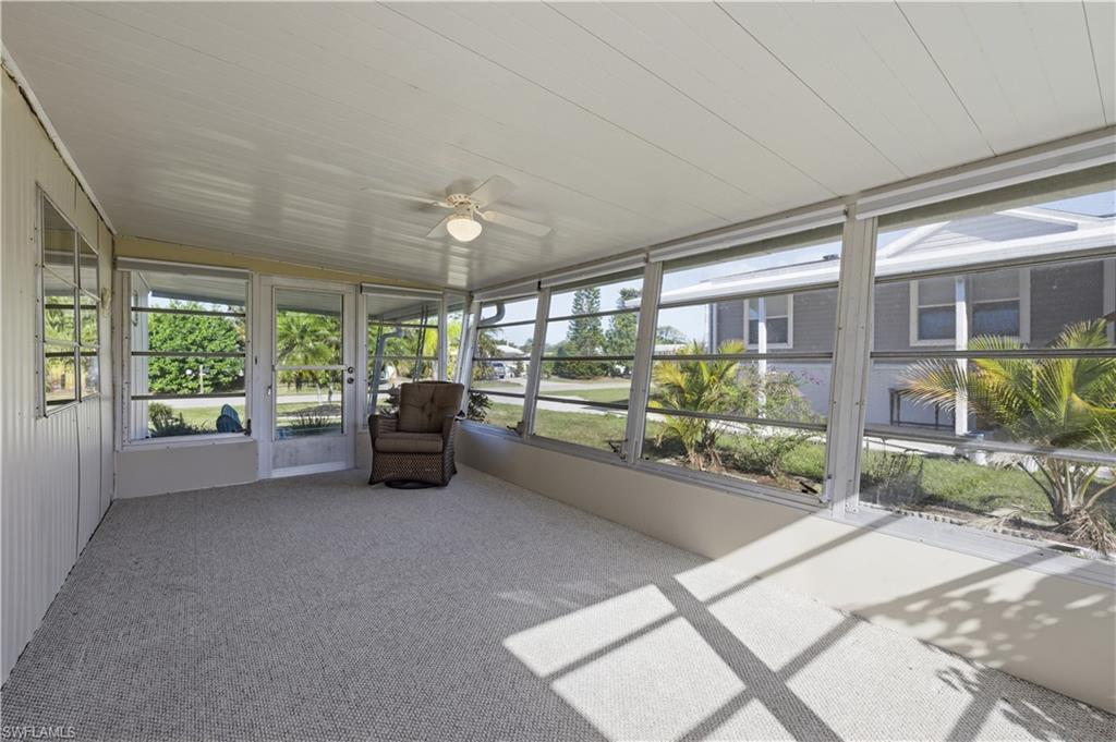 140 Rookery Road Naples, FL 34114 - Photo 8 of 19 Sunroom / solarium featuring a ceiling fan