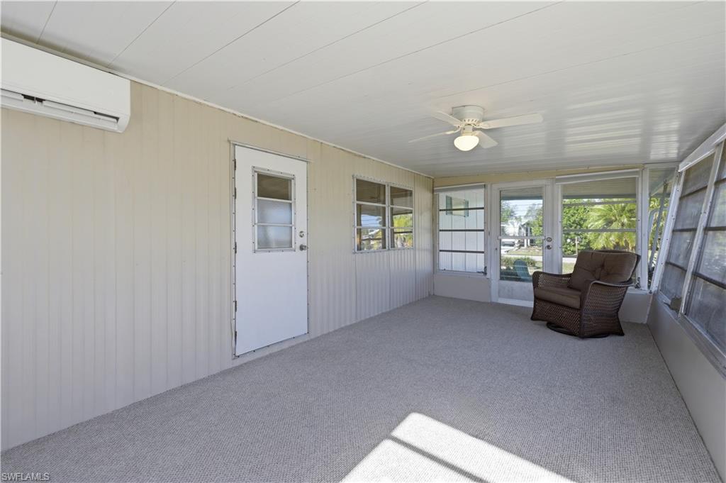 140 Rookery Road Naples, FL 34114 - Photo 9 of 19 Sunroom featuring ceiling fan and a mini split for heating / cooling