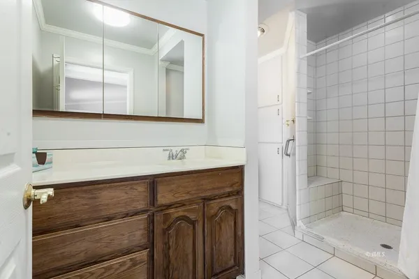 a view of an empty room with closet area