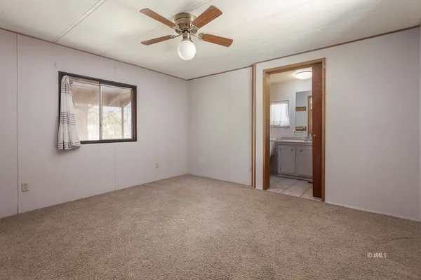 a picture of a bathroom with a shower