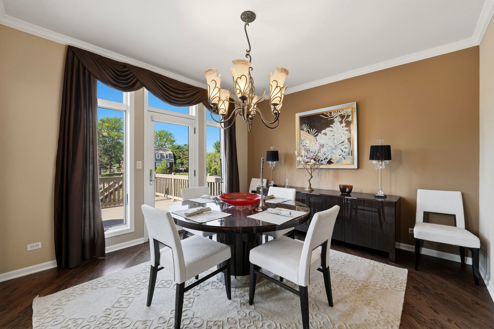 1406 Rue Paris Place Inverness, IL 60067 - Photo 7 of 35 a dining room with furniture a large window and wooden floor