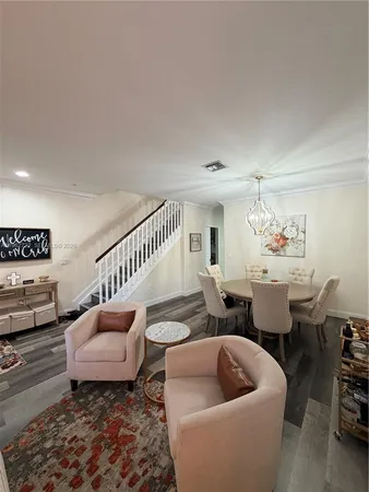 a living room with furniture and a couch