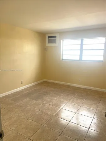 a view of a room with windows