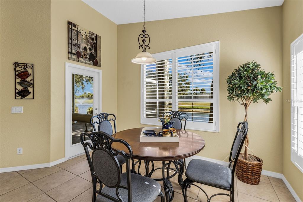 24612 Buckingham Way Punta Gorda, FL 33980 - Photo 11 of 42 a view of a dining room with furniture and window