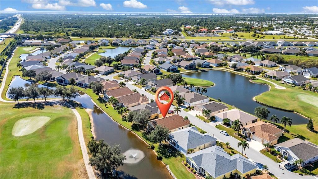 24612 Buckingham Way Punta Gorda, FL 33980 - Photo 20 of 42 an aerial view of residential houses with outdoor space