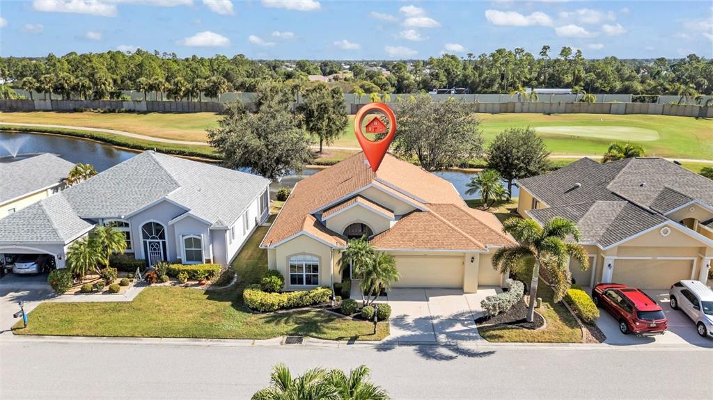 24612 Buckingham Way Punta Gorda, FL 33980 - Photo 21 of 42 an aerial view of a house with outdoor space and lake view