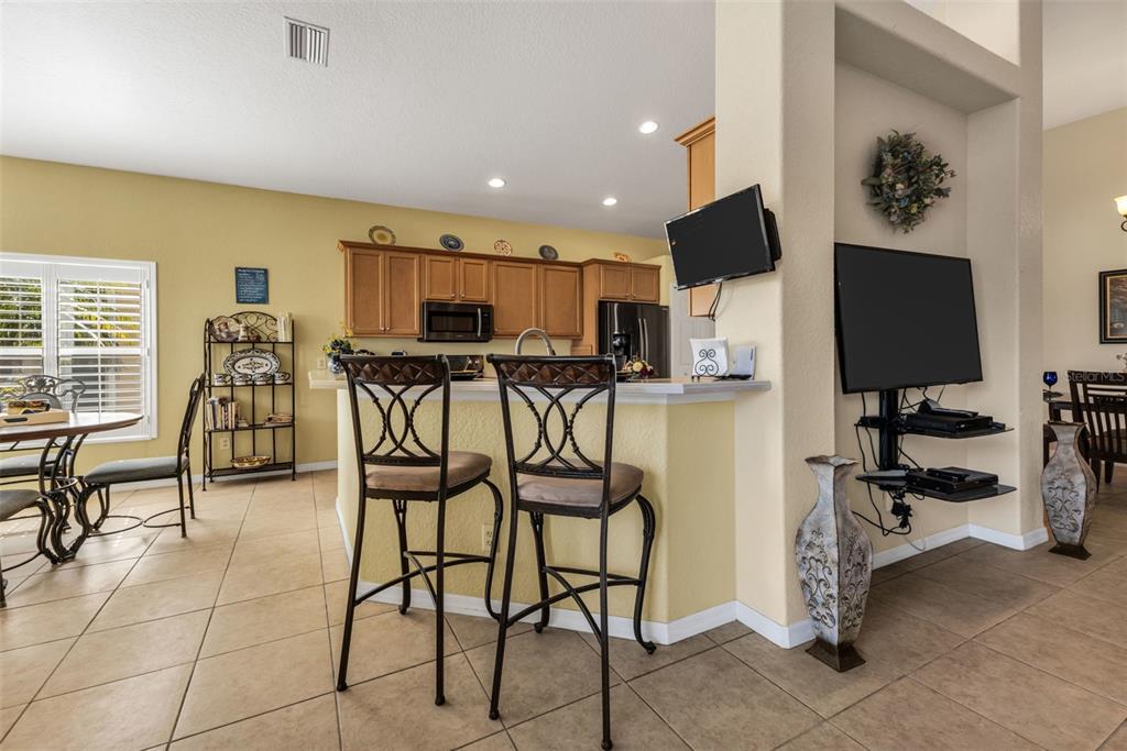 24612 Buckingham Way Punta Gorda, FL 33980 - Photo 10 of 42 a dinning room and dining room with furniture