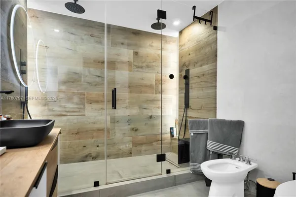 a bedroom with a bed and dresser