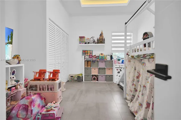 a view of a room with baby toys