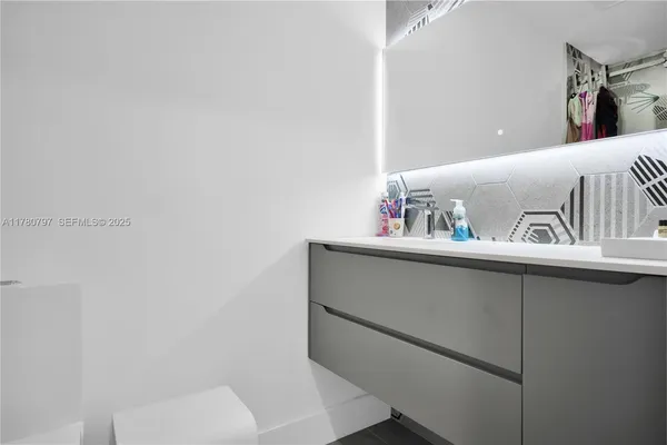 a bathroom with a bathtub and shower