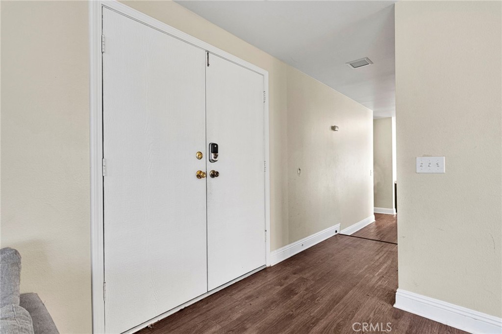 1087 Baseline Road La Verne, CA 91750 - Photo 6 of 39 a view of a hallway with wooden floor