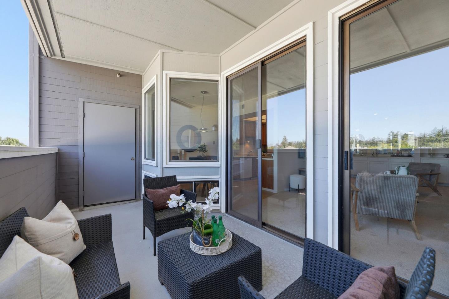 22330 Homestead Road, Unit 226 Cupertino, CA 95014 - Photo 20 of 38 a living room with furniture and a window