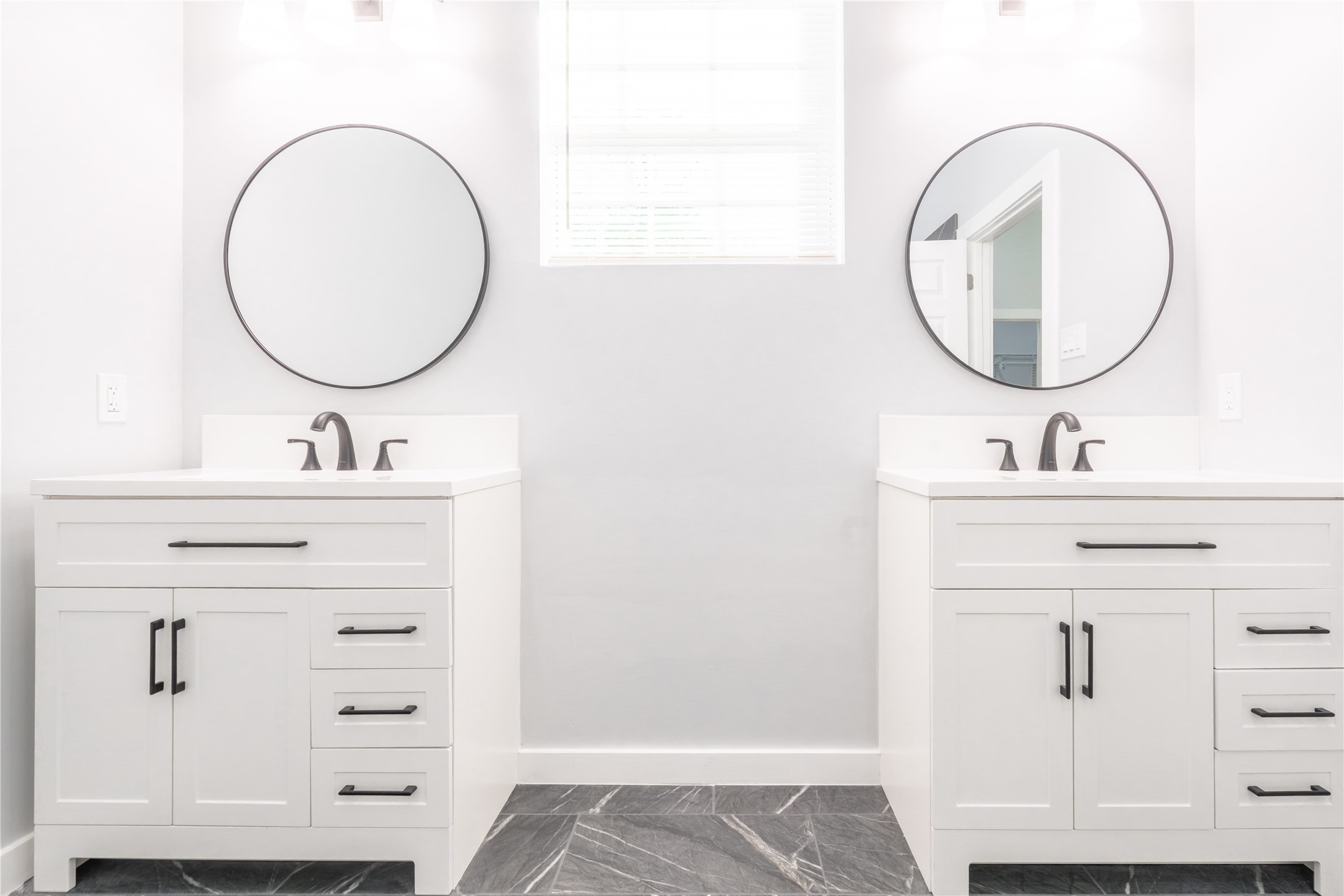 164 County Road 3370 Cleveland, TX 77327 - Photo 21 of 28 a bathroom with a sink mirror and vanity