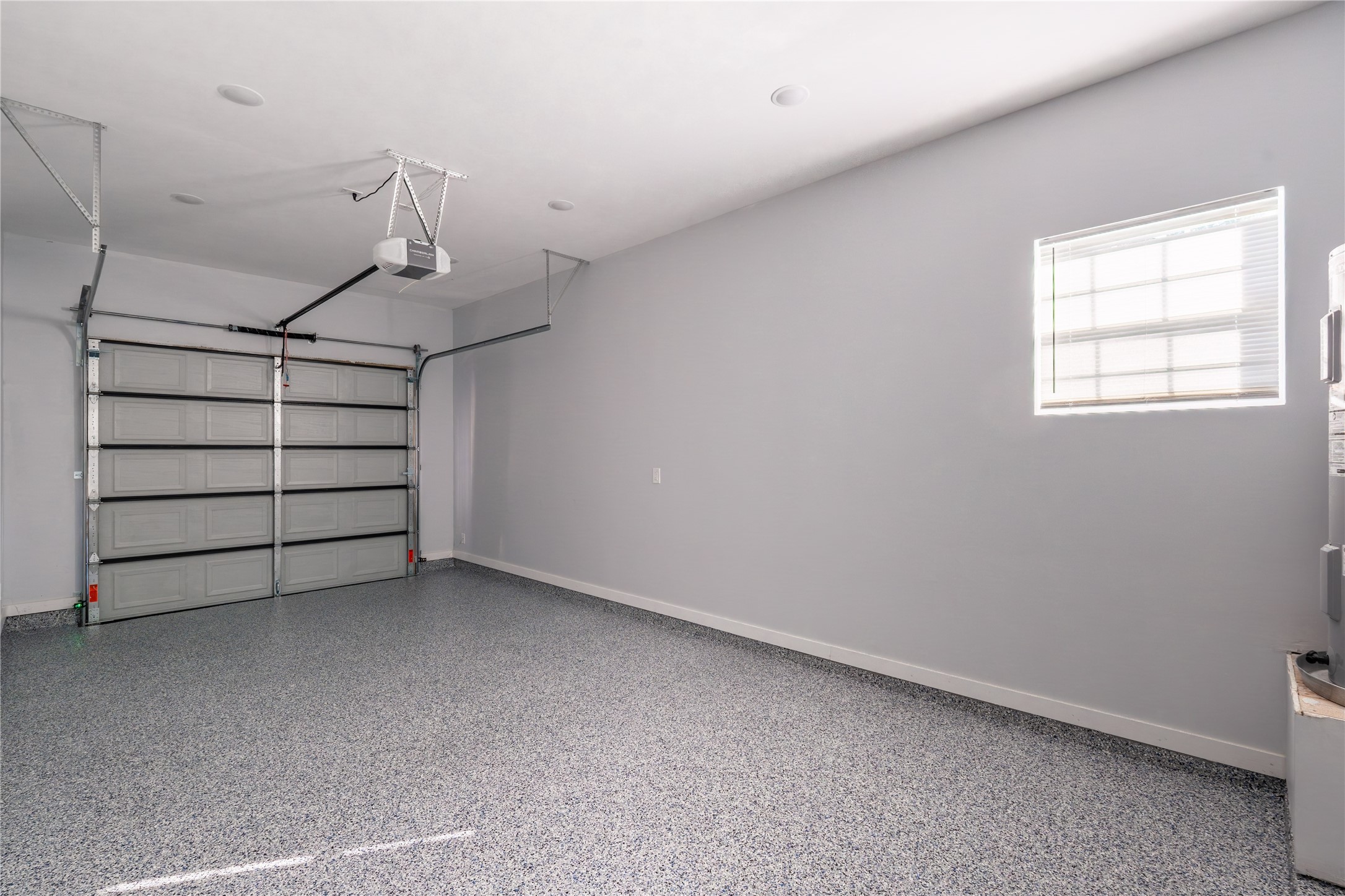 164 County Road 3370 Cleveland, TX 77327 - Photo 24 of 28 a view of a big room with racks on the wall