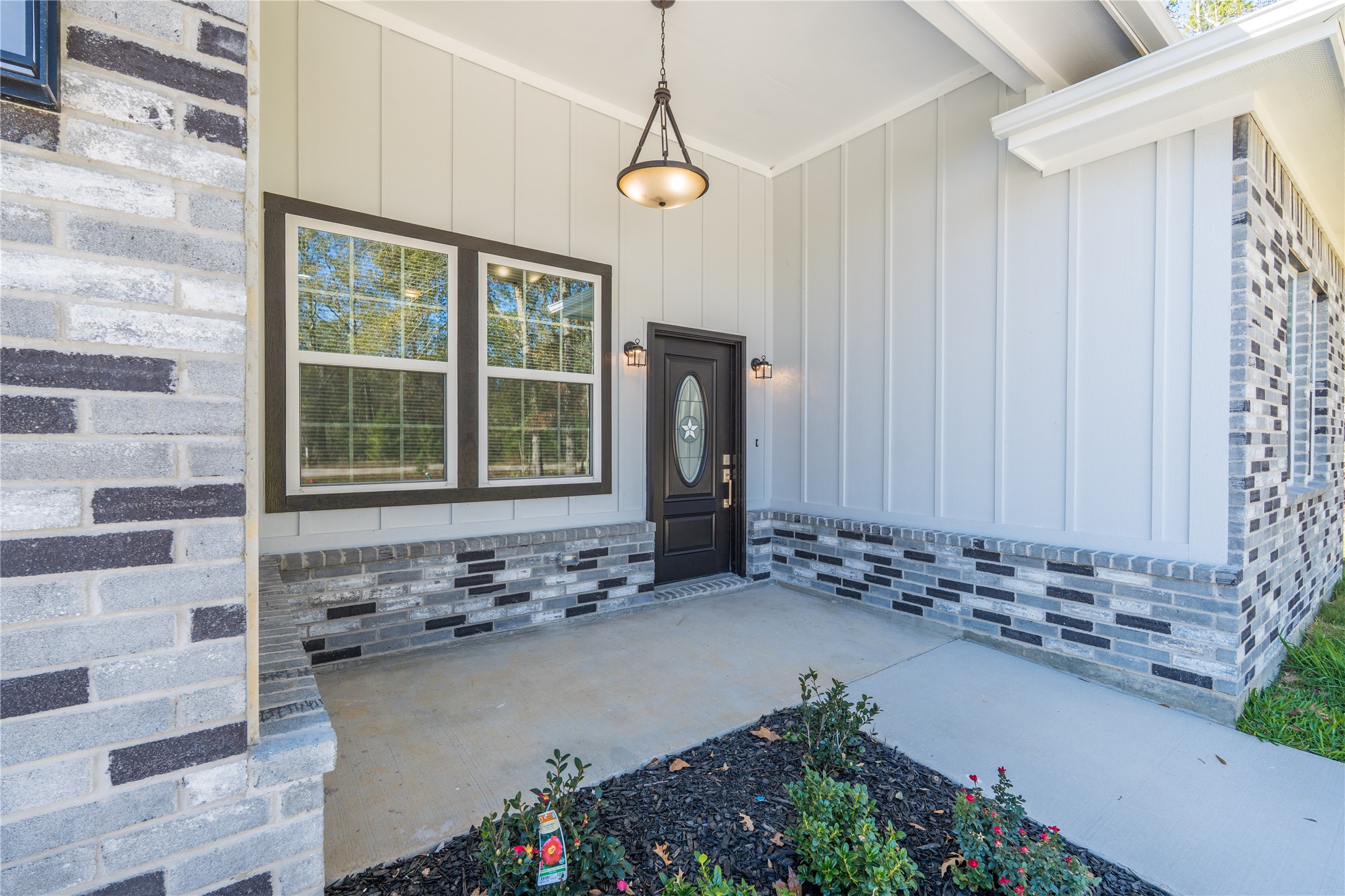 164 County Road 3370 Cleveland, TX 77327 - Photo 6 of 28 a view of a entryway door of the house