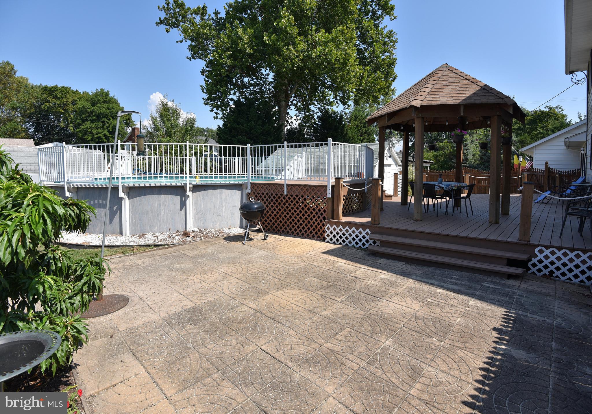 7826 Harbor Road Pasadena, MD 21122 - Photo 14 of 66 Large patio off the deck.
