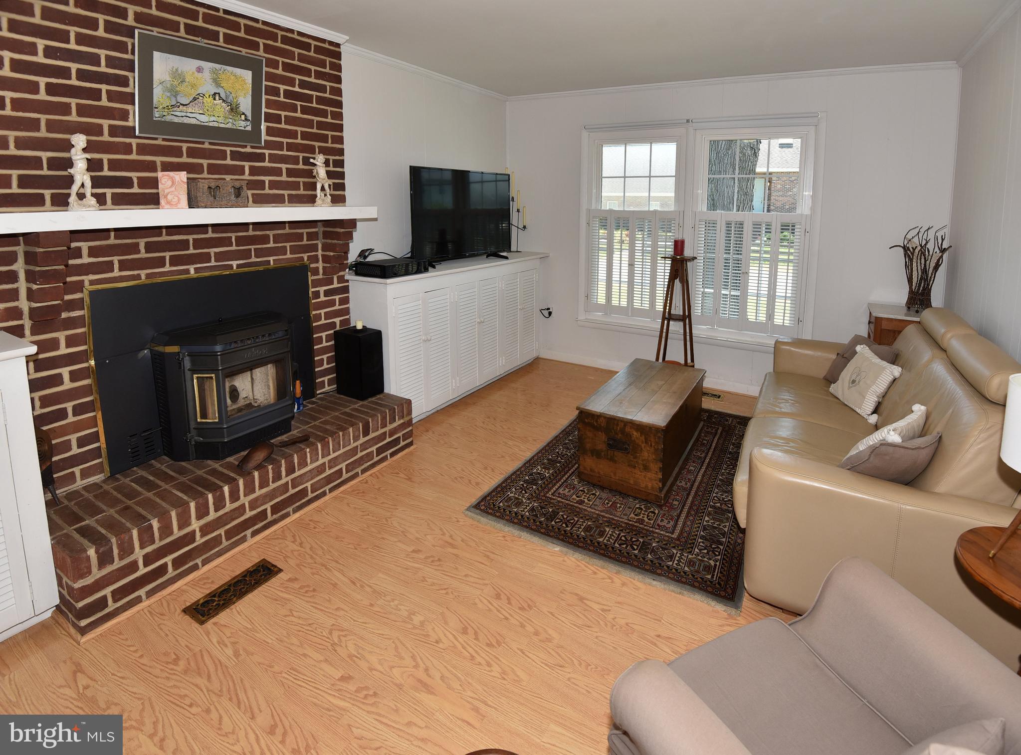7826 Harbor Road Pasadena, MD 21122 - Photo 3 of 66 Beautiful brick fireplace.