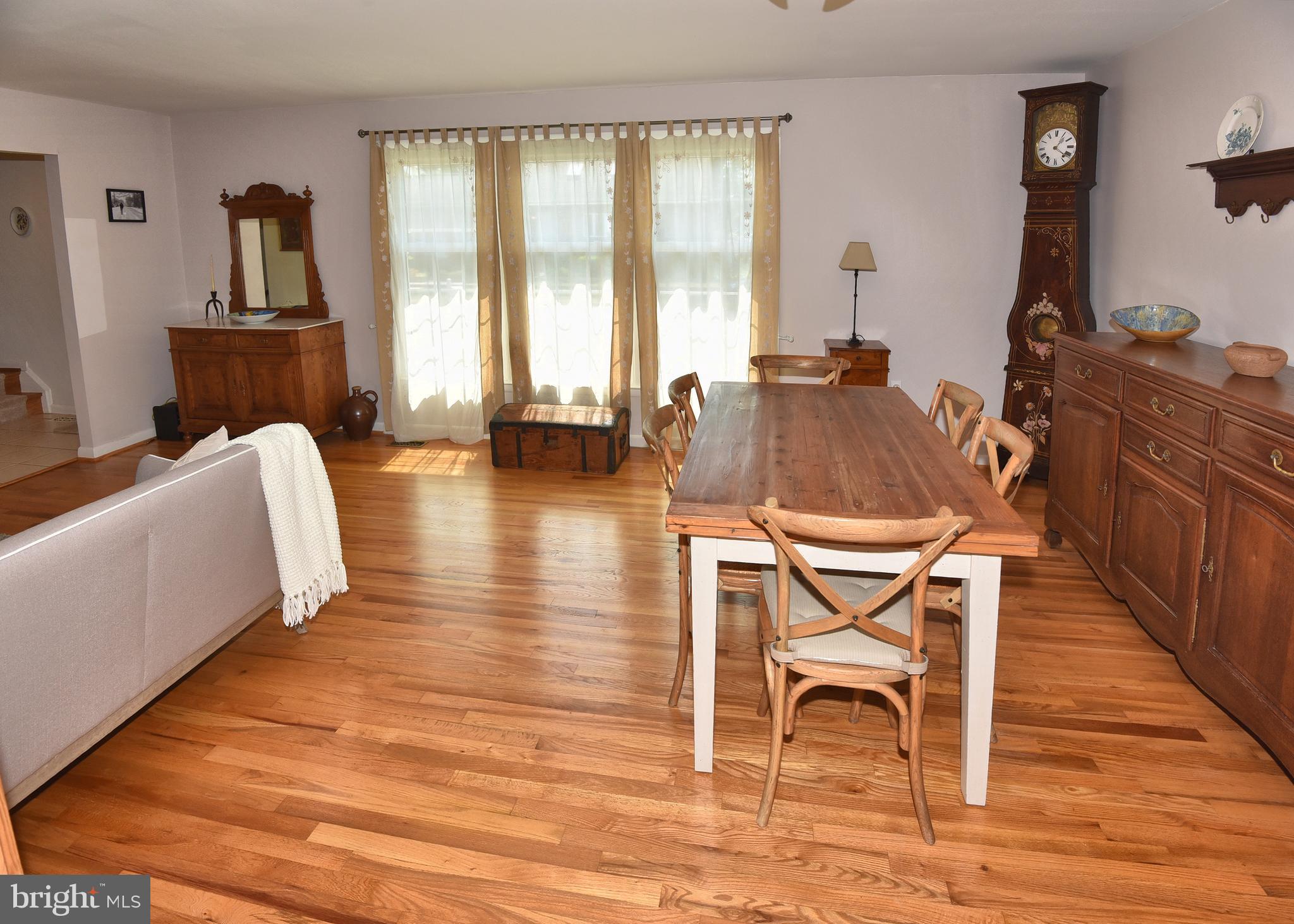 7826 Harbor Road Pasadena, MD 21122 - Photo 33 of 66 Lighting makes the hardwood floors pop.