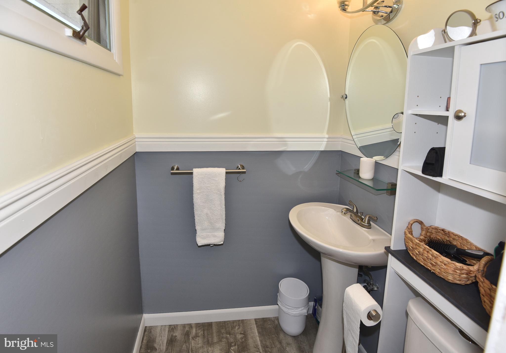 7826 Harbor Road Pasadena, MD 21122 - Photo 39 of 66 Half bath on the first floor.