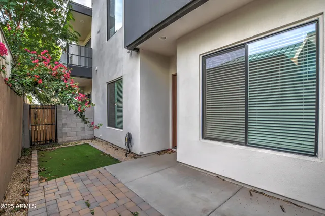 a view of balcony with furniture