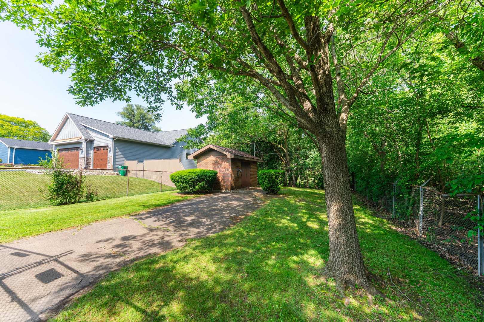 Lot 17-18 Roosevelt Road Winfield, IL 60190 - Photo 12 of 17 a front view of a house with garden