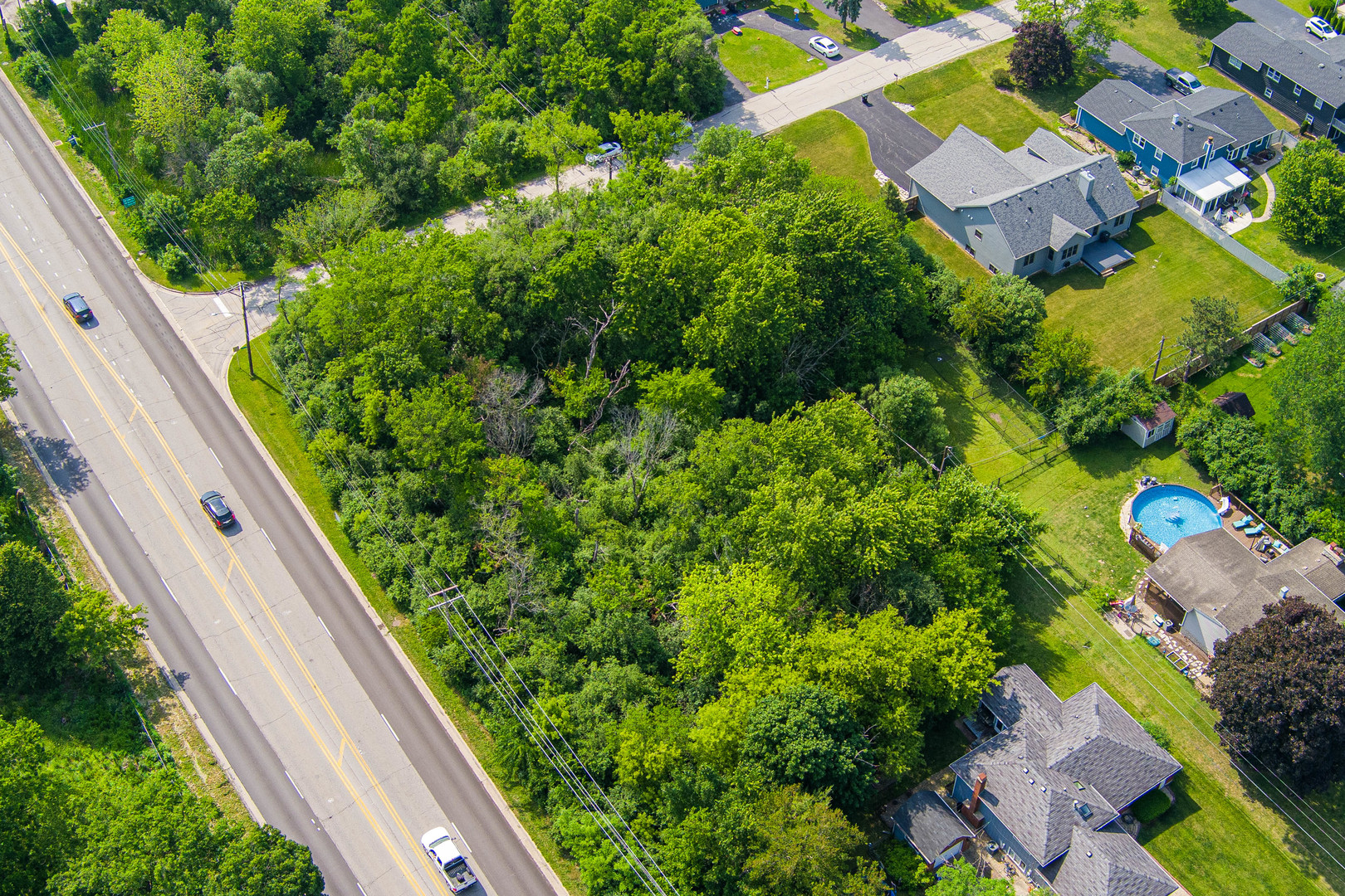 Lot 17-18 Roosevelt Road Winfield, IL 60190 - Photo 6 of 17 a view of a yard with potted plants