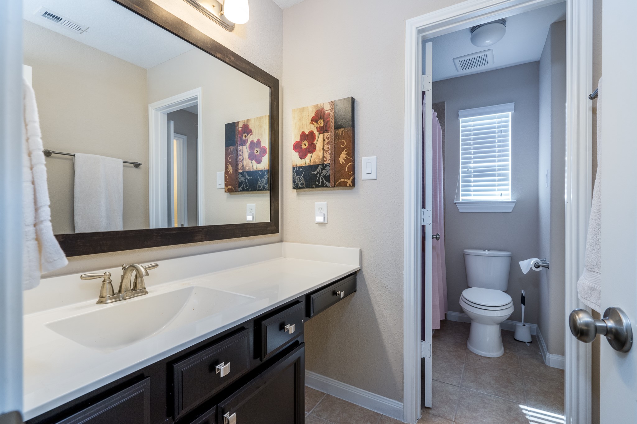 6231 Warwick Garden Lane Spring, TX 77379 - Photo 36 of 50 a bathroom with a sink a toilet a shower and a mirror