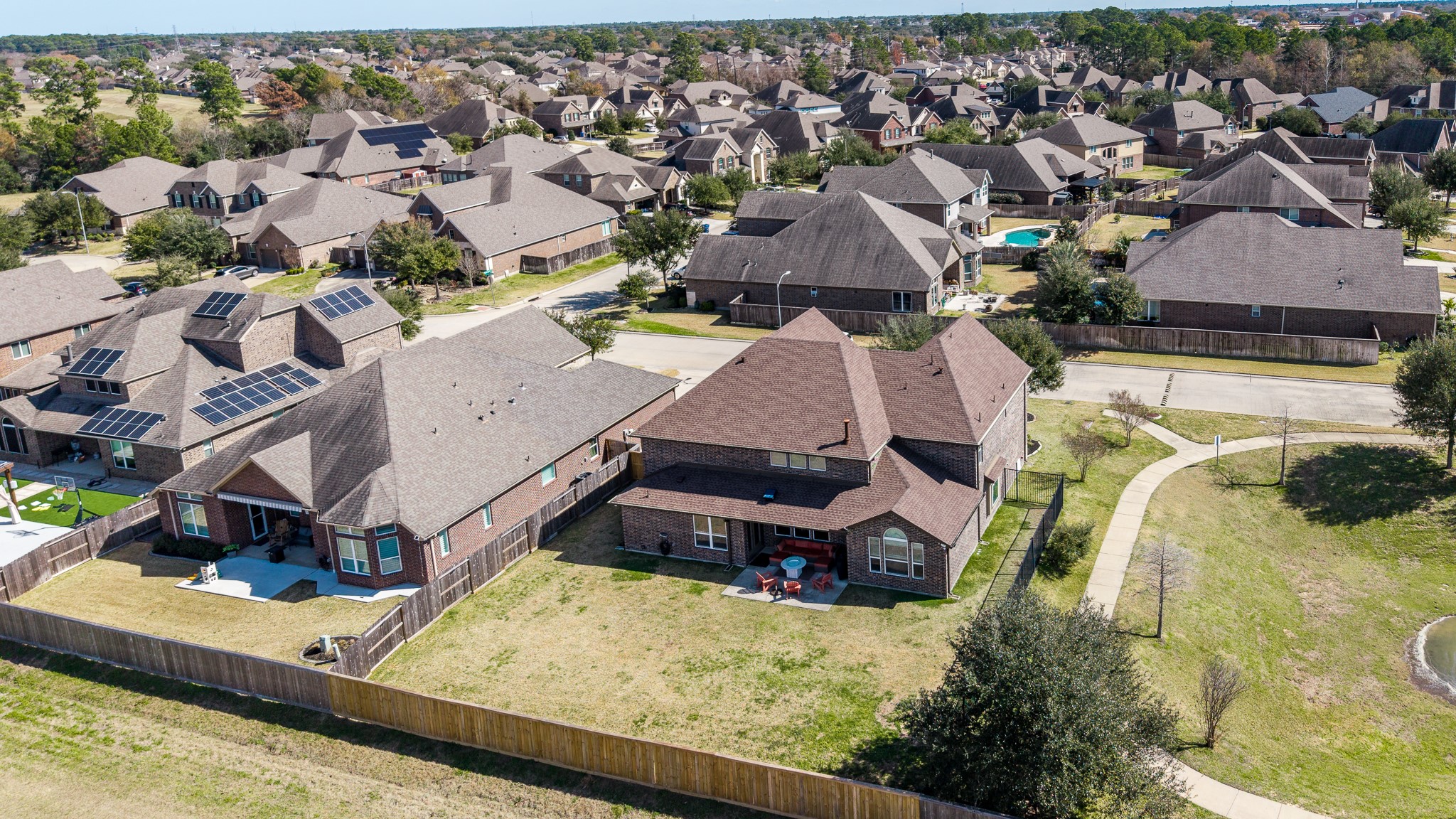 6231 Warwick Garden Lane Spring, TX 77379 - Photo 42 of 50 an aerial view of residential houses with outdoor space