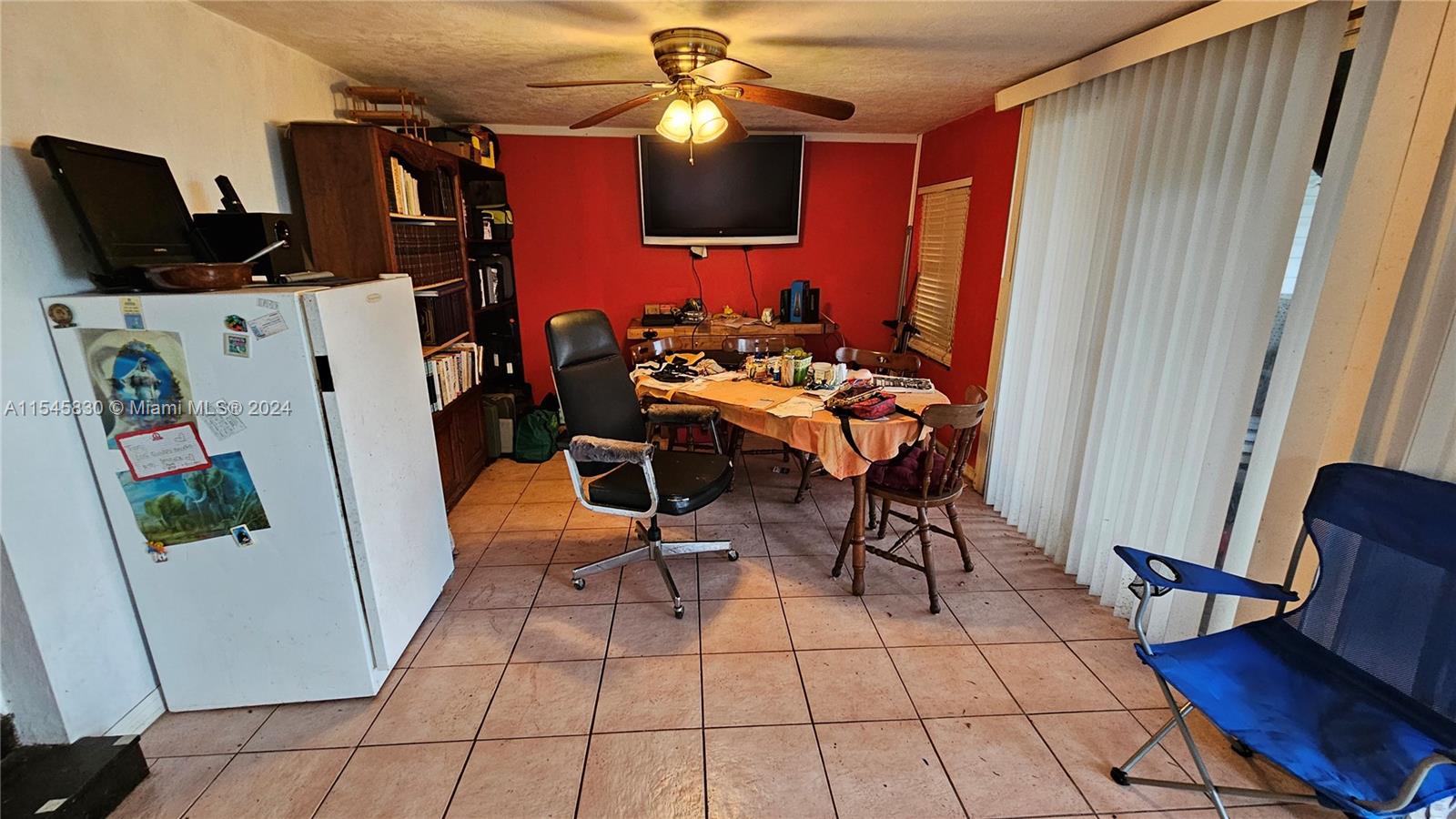 1823 John Road Clewiston, FL 33440 - Photo 26 of 34 a dining room with furniture and wooden floor