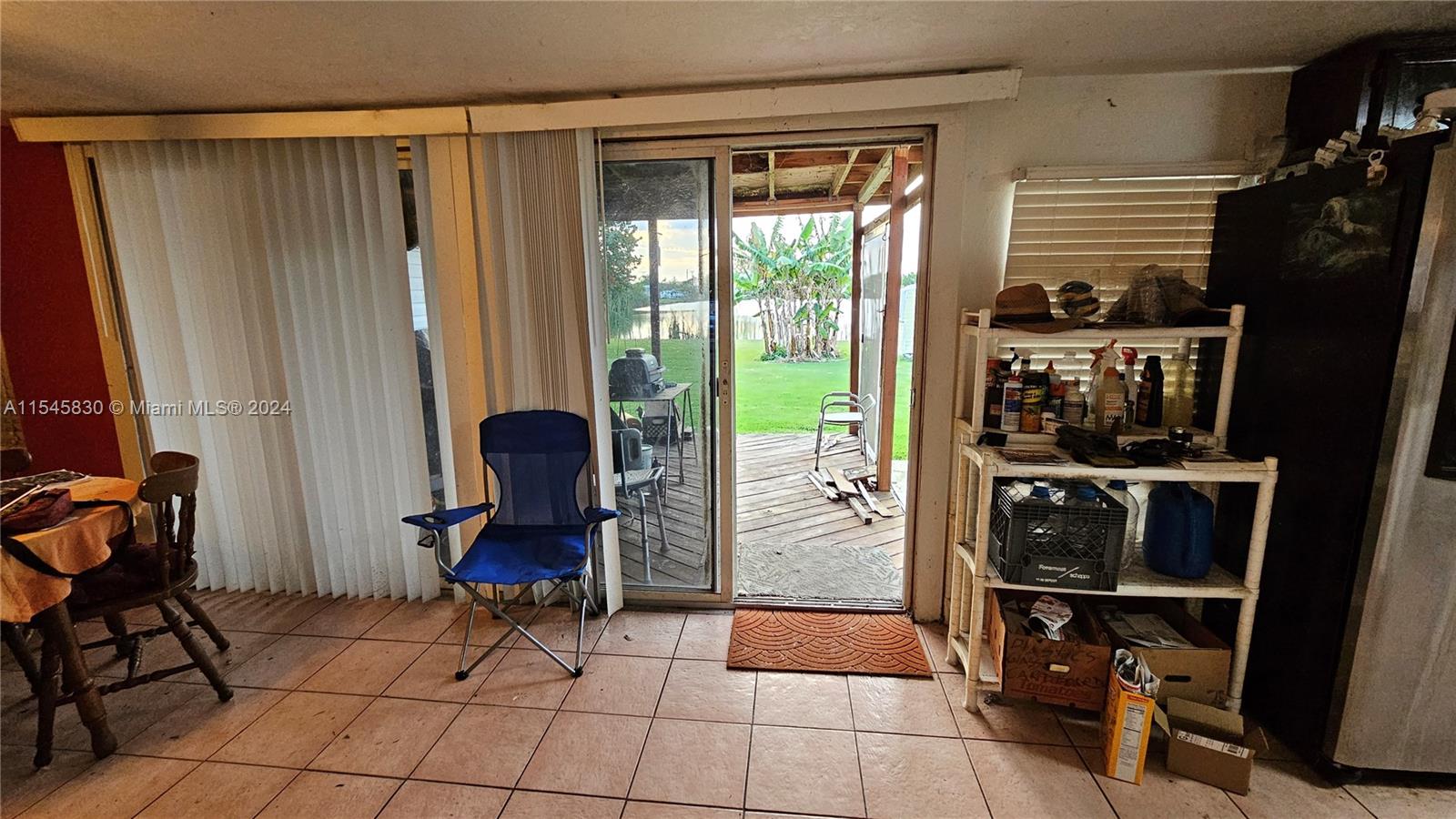 1823 John Road Clewiston, FL 33440 - Photo 27 of 34 a view of workspace with lounge chair and windows