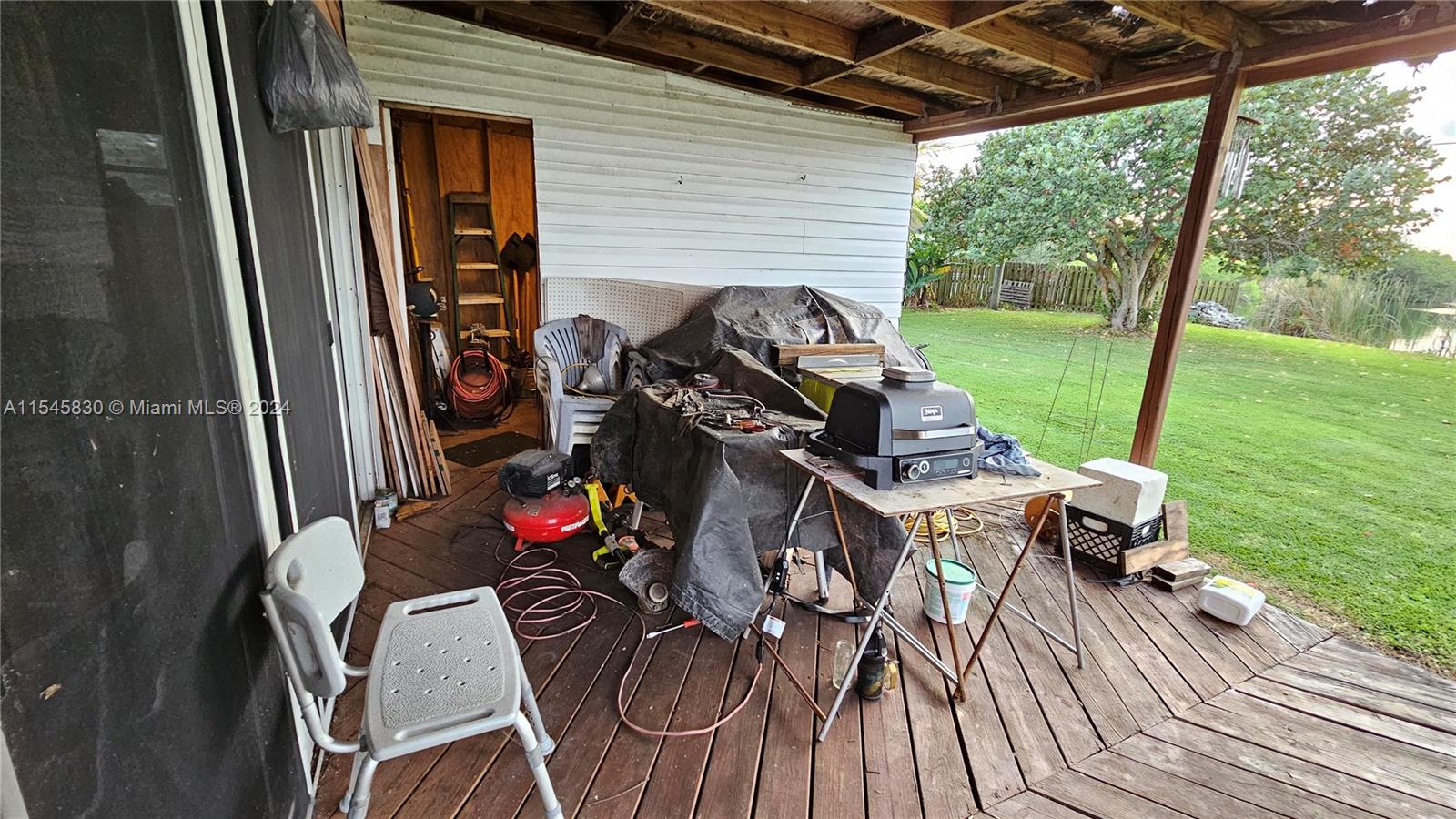 1823 John Road Clewiston, FL 33440 - Photo 29 of 34 a view of deck with patio