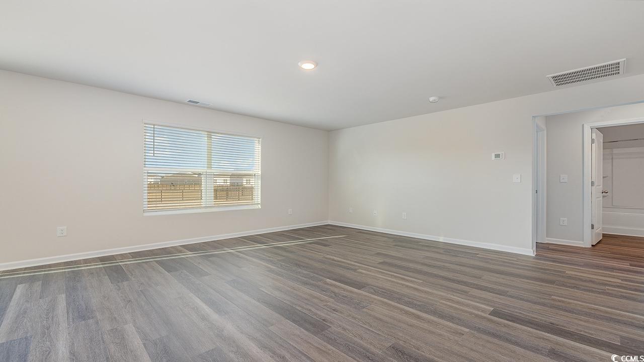 6067 Fuller Rdg Court Conway, SC 29526 - Photo 11 of 32 Empty room featuring dark hardwood / wood-style fl