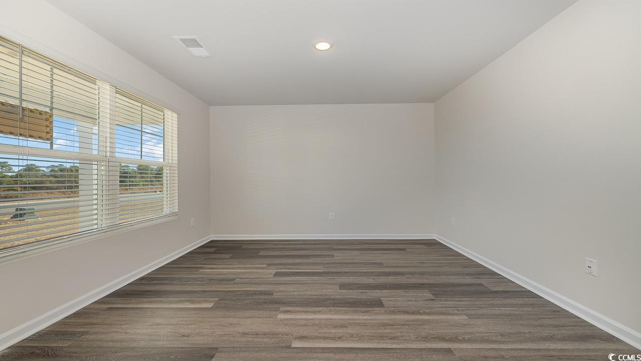 6067 Fuller Rdg Court Conway, SC 29526 - Photo 4 of 32 Unfurnished room with dark hardwood / wood-style f