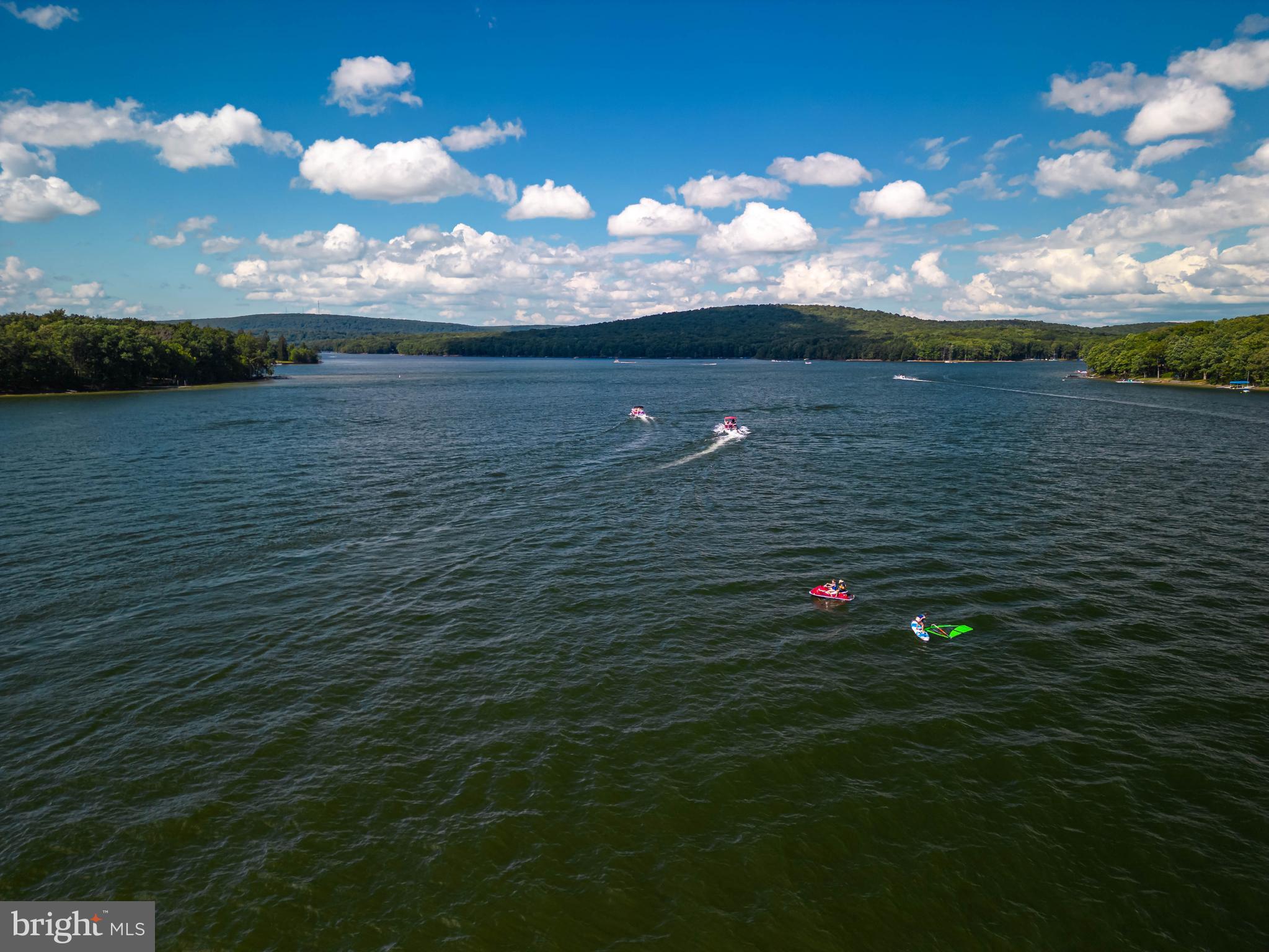 100 North Camp Road McHenry, MD 21541 - Photo 4 of 8 a view of an outdoor space and a lake view