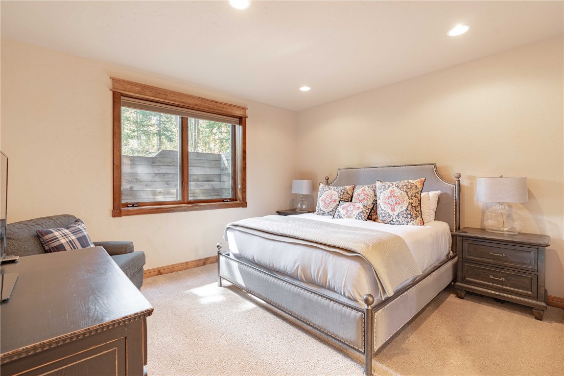 71 Cucumber Patch Placer Road, Unit 7 Breckenridge, CO 80424 - Photo 13 of 21 a bedroom with a bed and window