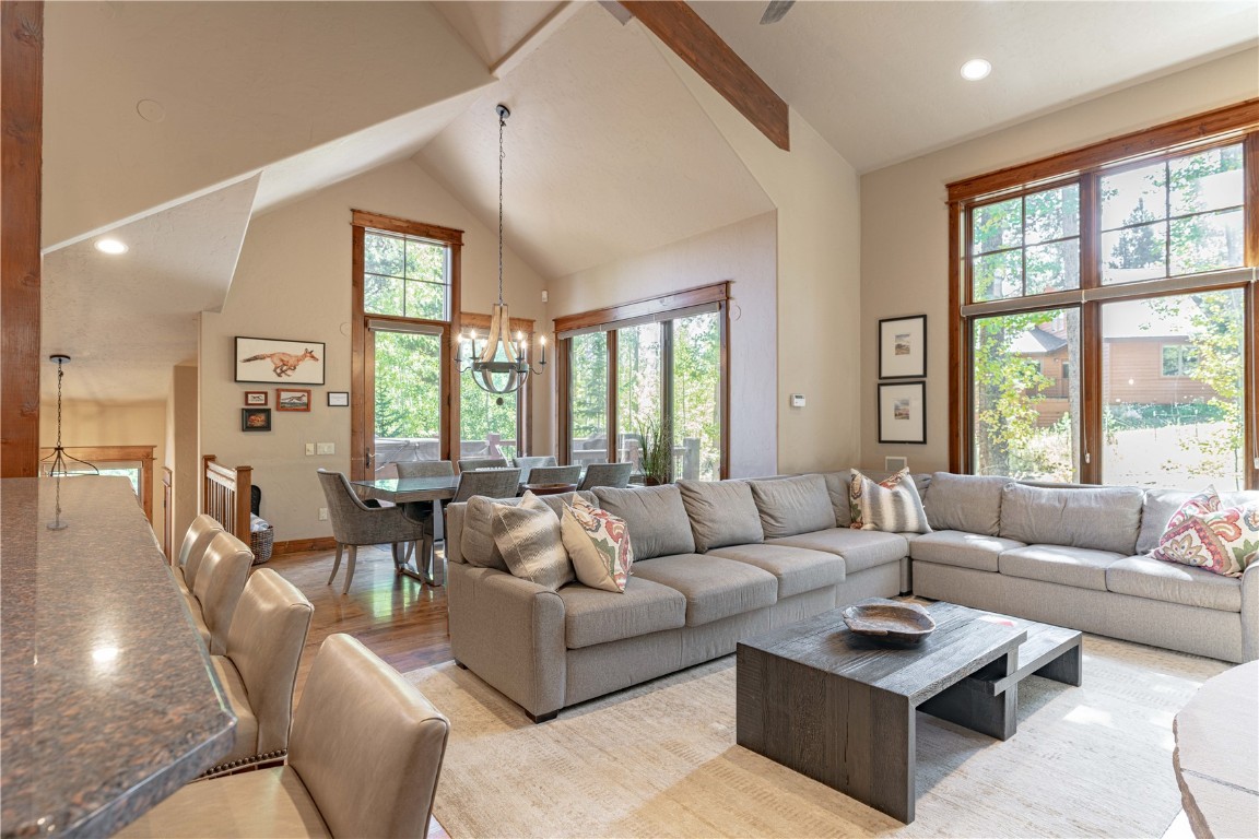 71 Cucumber Patch Placer Road, Unit 7 Breckenridge, CO 80424 - Photo 3 of 21 a living room with furniture and large windows