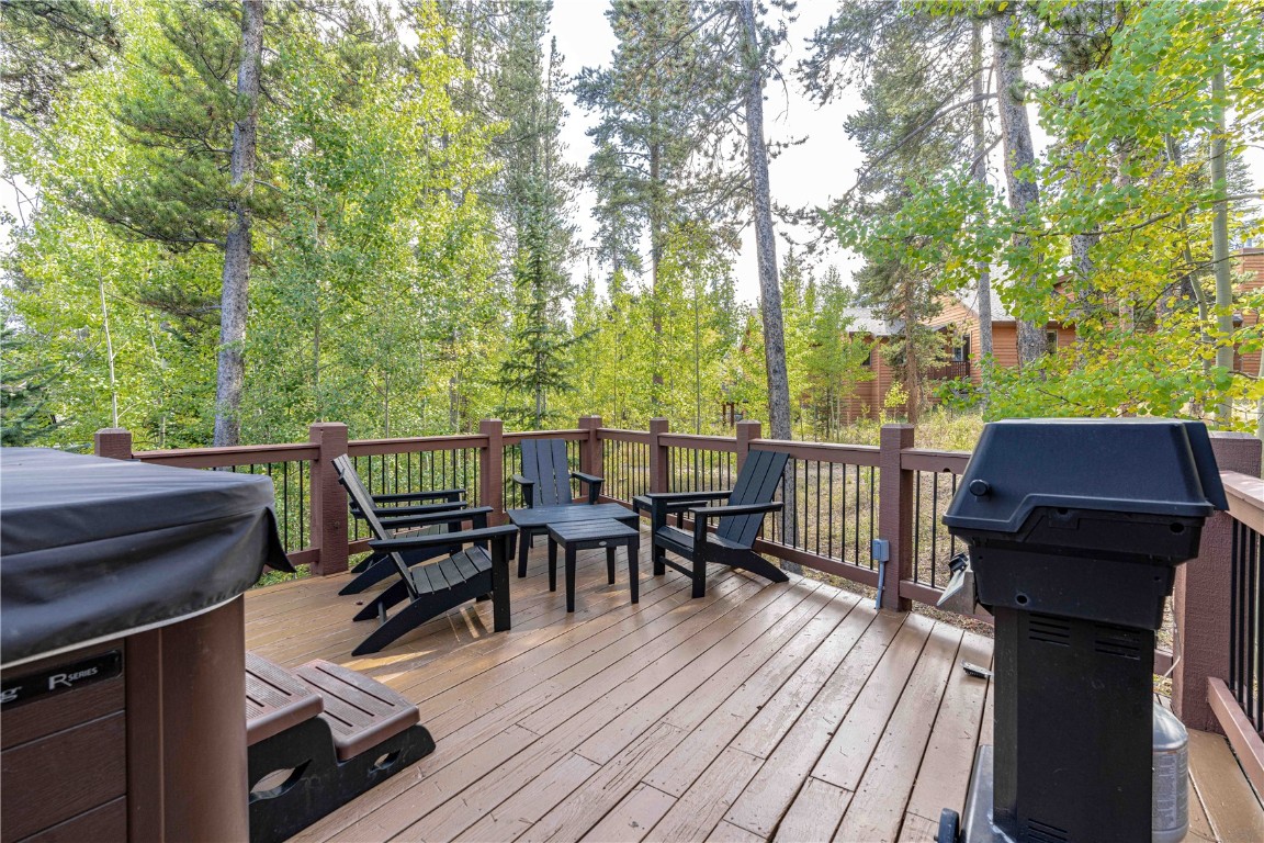 71 Cucumber Patch Placer Road, Unit 7 Breckenridge, CO 80424 - Photo 7 of 21 a view of a patio with wooden floor and outdoor seating