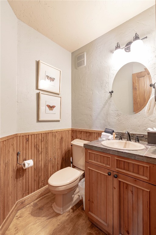 71 Cucumber Patch Placer Road, Unit 7 Breckenridge, CO 80424 - Photo 8 of 21 a bathroom with a toilet a sink and mirror