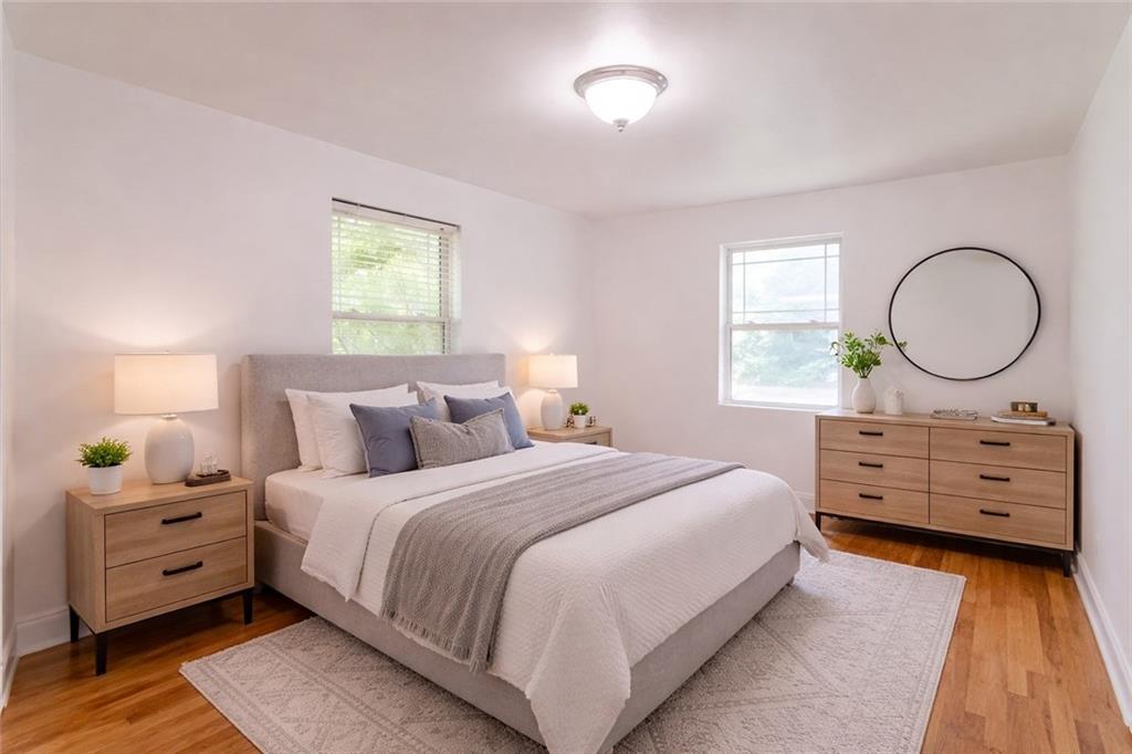24 Daniel Street Southeast, Unit 8 Atlanta, GA 30312 - Photo 20 of 29 a bedroom with a bed and a dresser