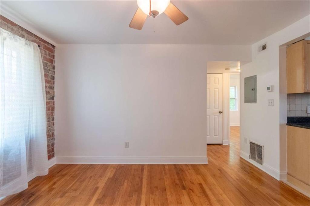 24 Daniel Street Southeast, Unit 8 Atlanta, GA 30312 - Photo 7 of 29 a view of empty room with wooden floor