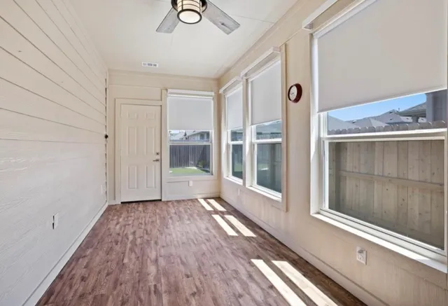 a utility room with sink dryer and washer