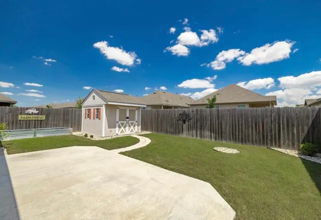 a view of a house with a swimming pool