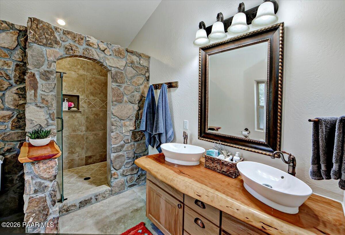 835 Happy Valley Road Prescott, AZ 86305 - Photo 17 of 48 a bathroom with a sink double vanity and a mirror